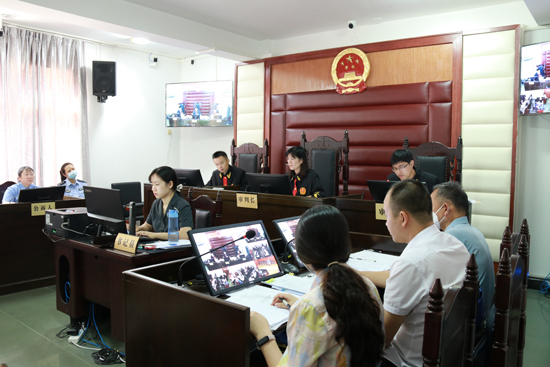 七星区人民法院公开开庭审理涉嫌非法吸收公众存款罪一案。桂林市中级人民法院供图
