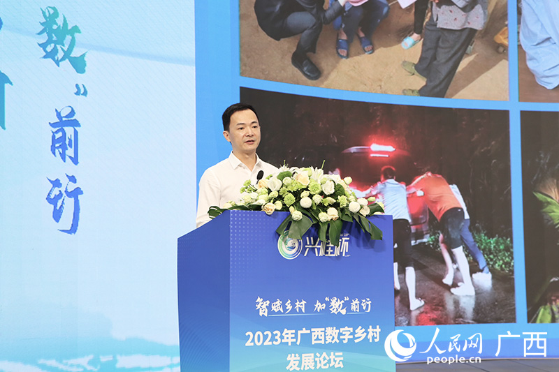 涂志辉作主题演讲。人民网记者 覃心摄