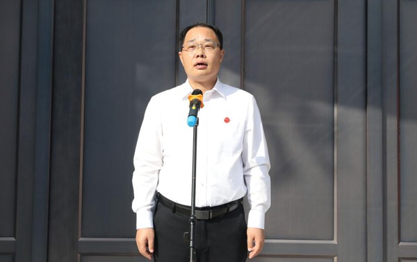 马献力宣布校史馆开馆。李丽雯摄