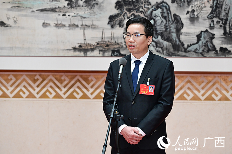玉建国代表。人民网记者 雷琦竣摄