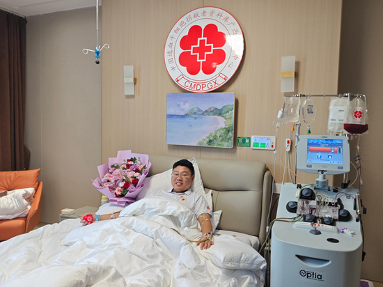 付怡铜捐献造血干细胞。李丽雯摄